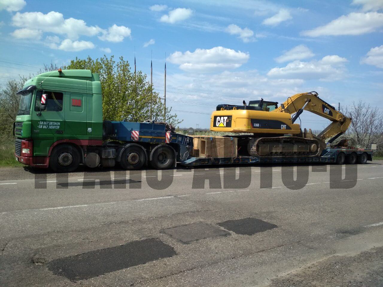 Перевозка экскаватора Катерпиль Мариуполь