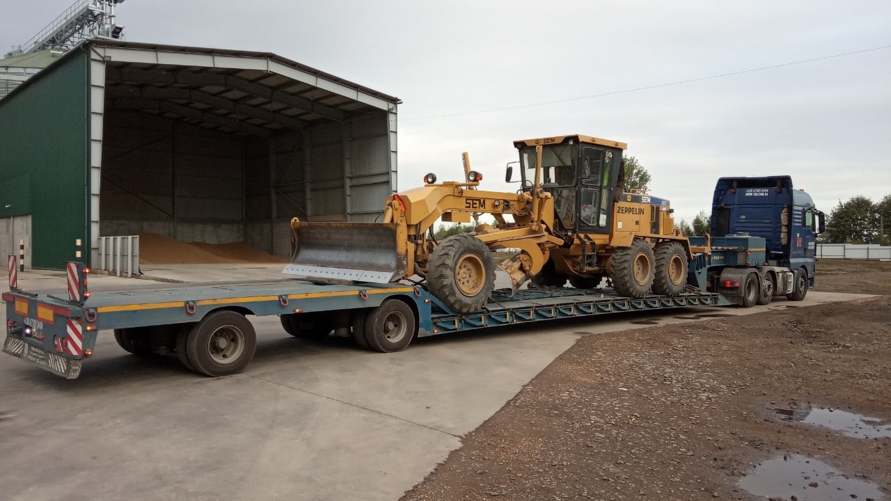Перевозка автогрейдера zeppelin