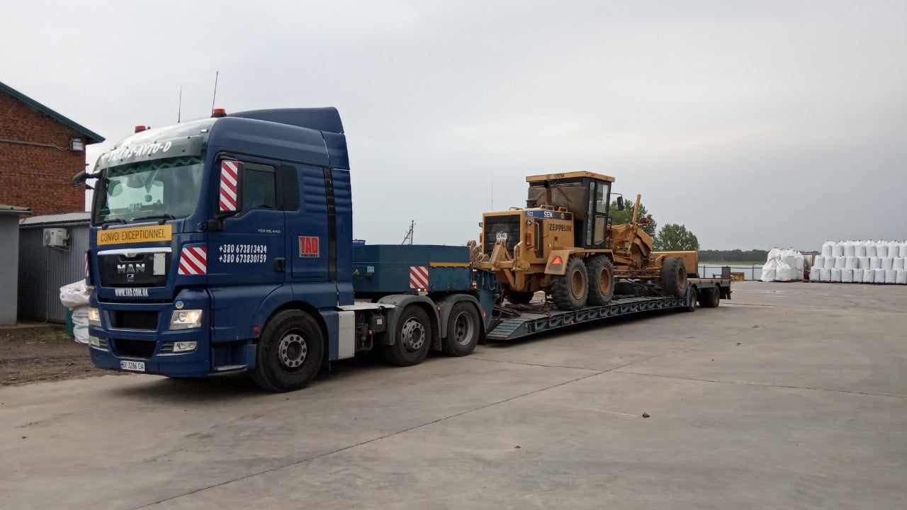 Перевозка грейдера zeppelin