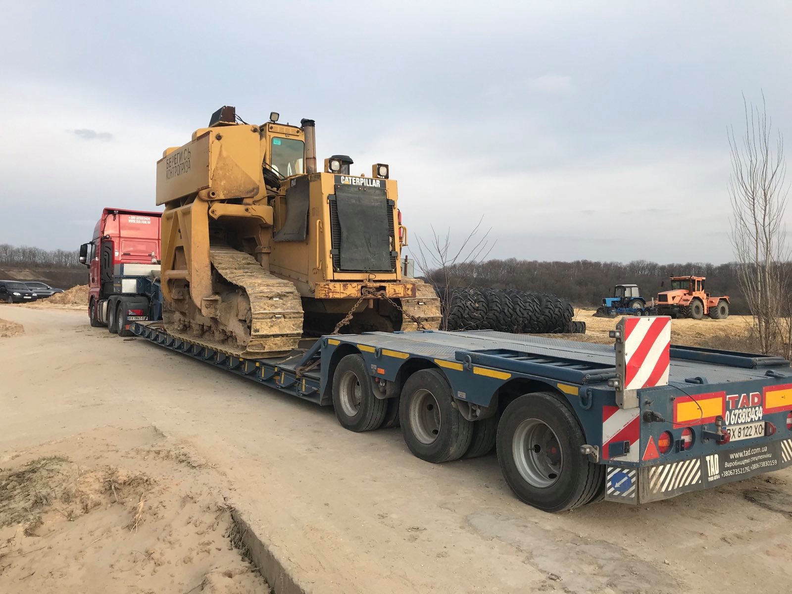 Transportation of CAT construction machinery