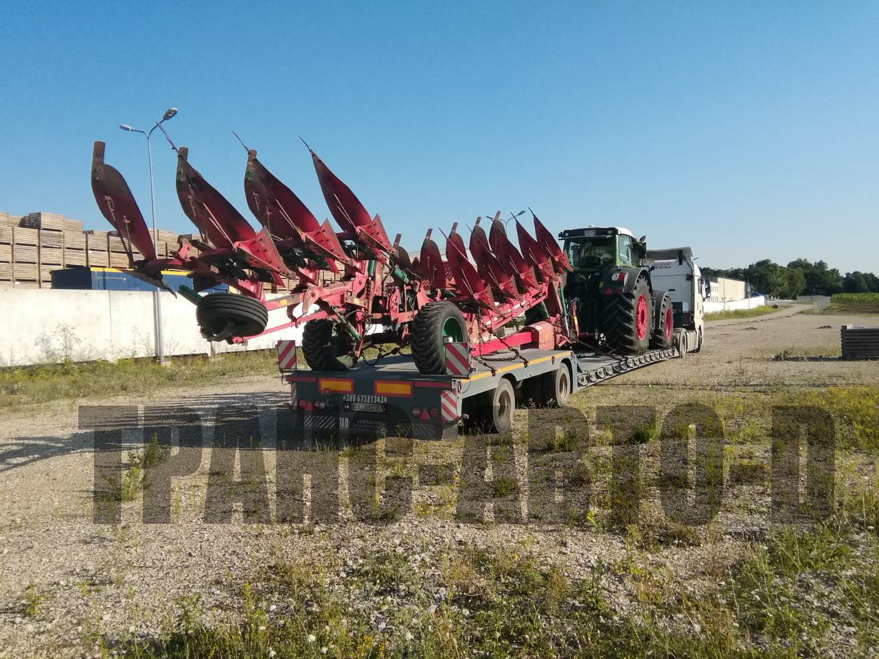 Transportation of a tractor with plows in Ukraine and abroad-2
