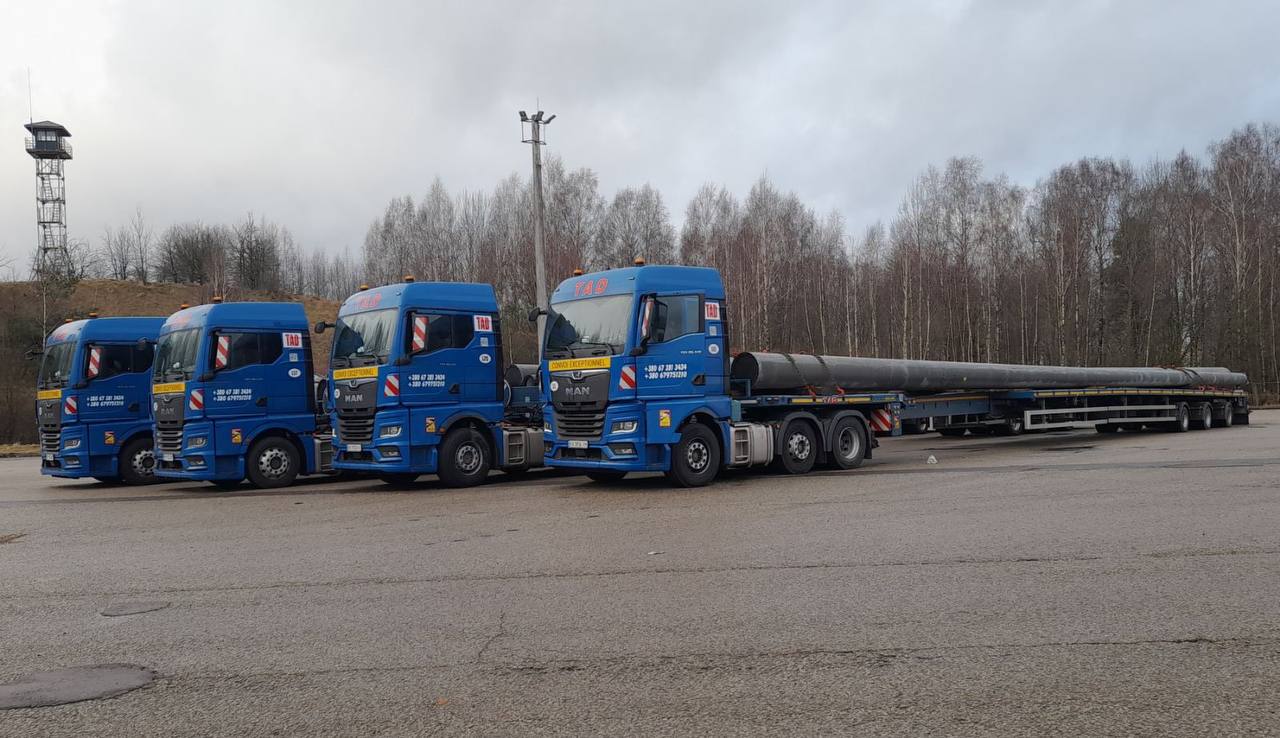 Transportation of long beams